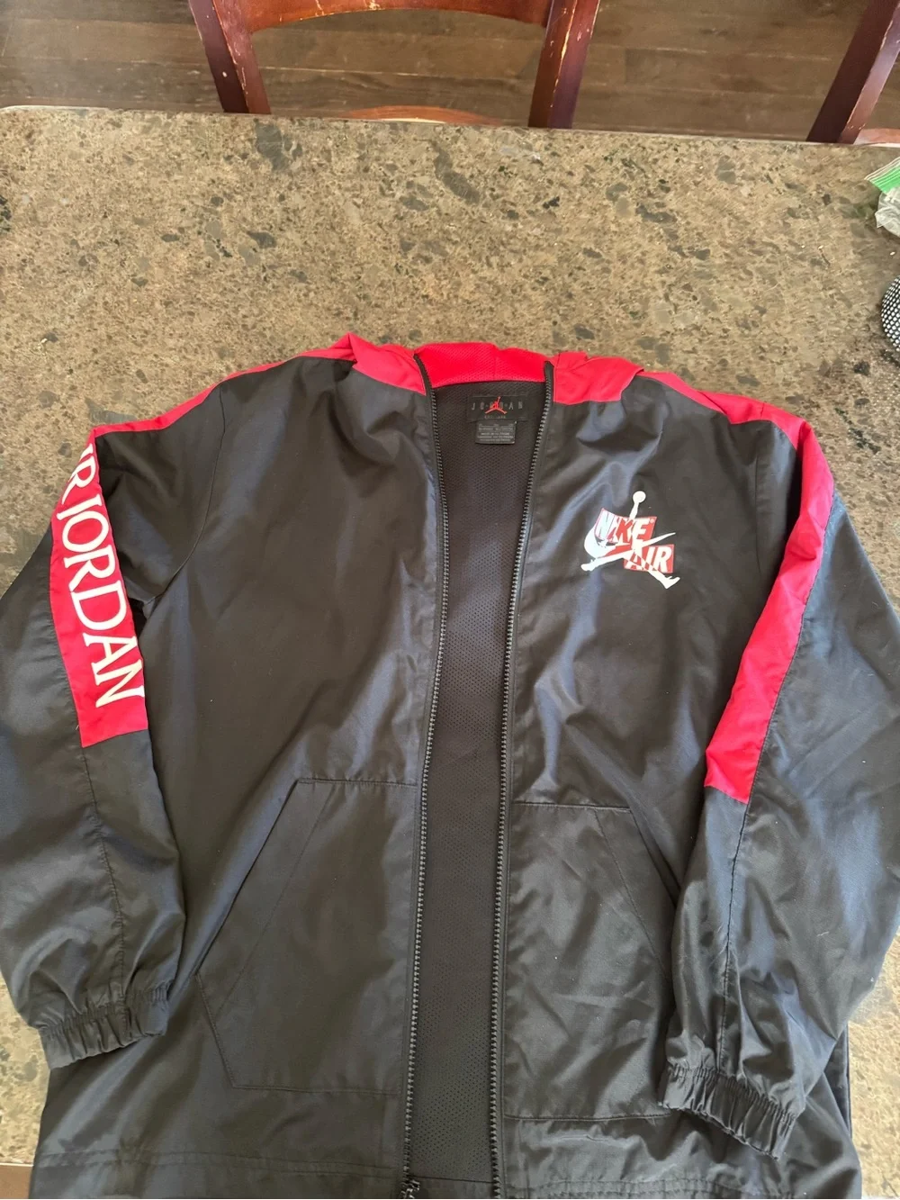 Jordan Black and Red Hooded Windbreaker with Air Jordan Sleeve Logo